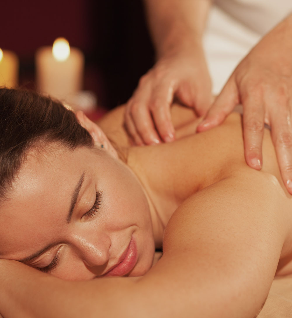 A woman's hands on a man's chest
